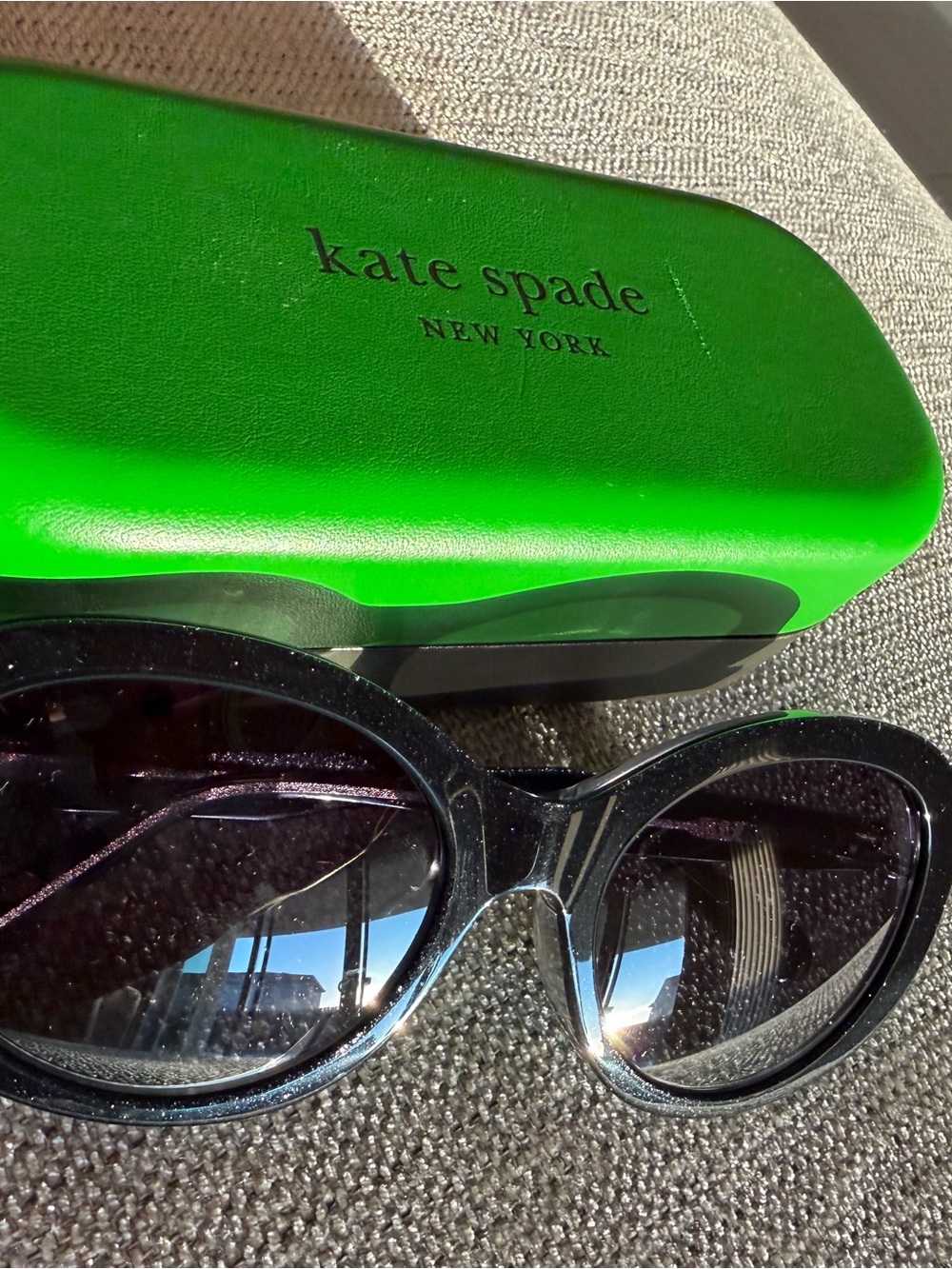 kate spade Black Oval Sunglasses with Bright Green Case